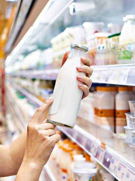istock Woman shopping milk 1485167442
