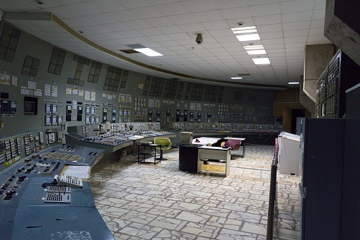This image showcases a large control room with a modern interior