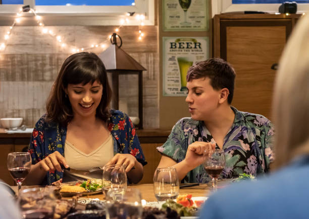 istock Lesbian couple talking with friends at a barbecue 1485170230