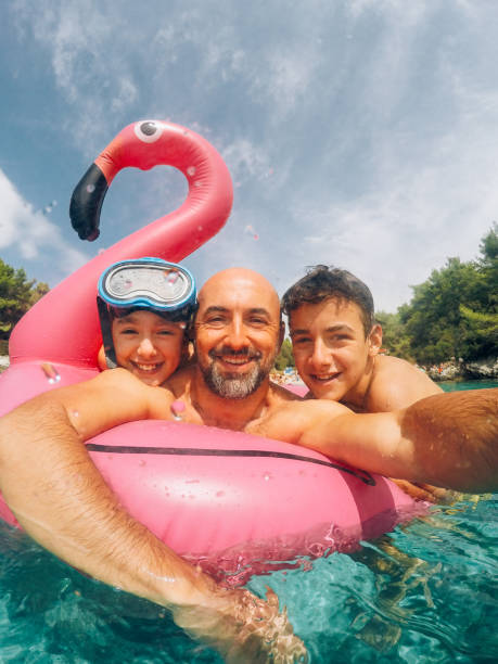 Family Taking A Selfie On Their Vacation