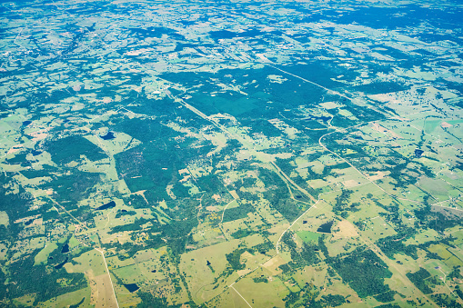 Aerial landscape with forests and farmland near Houston Texas USA.