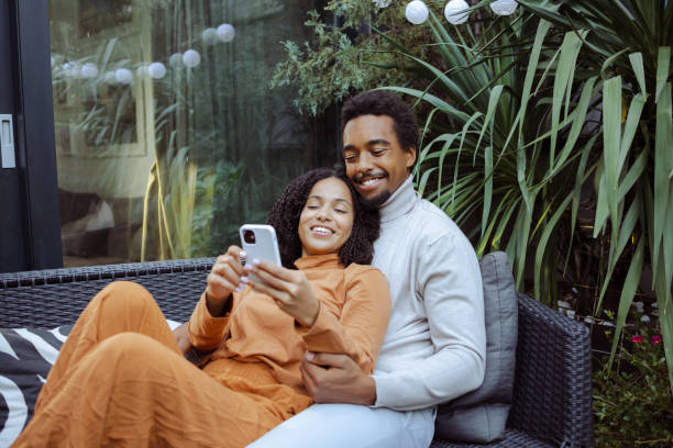 istock Happy young African American couple using smart phone 1485179862
