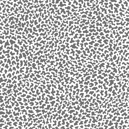 Vector seamless pattern with dark grey spots on a white background