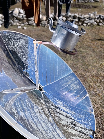 Solar kettle.Ecology concept. Renewable green energy. Khumbu valley