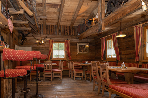 Interior and wooden decoration of a small restaurant in an alpine village, Austria. High quality photo