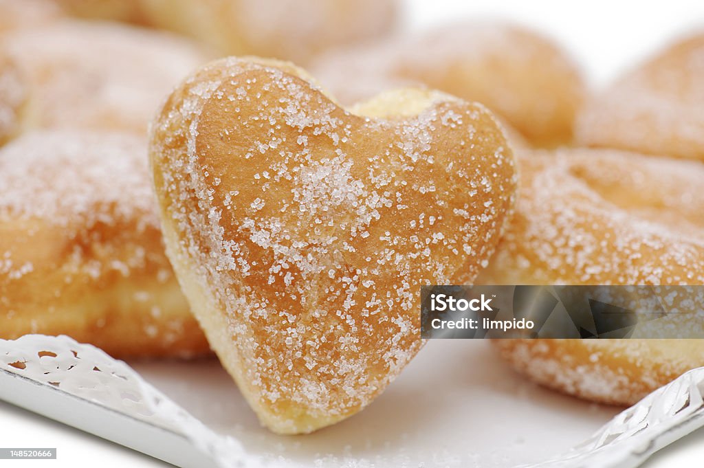 donuts donuts heart-shaped on tray, close-up Baked Stock Photo