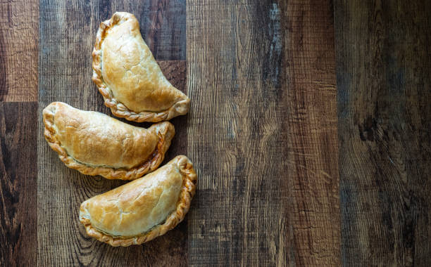 istock Delectable Selection of Pasty on Rustic Wooden Table 1485210274