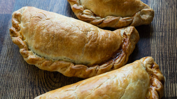 istock Delectable Selection of Pasty on Rustic Wooden Table 1485210679
