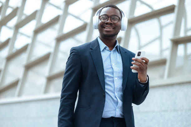 istock Happy African American man using modern technology on the street 1485211253