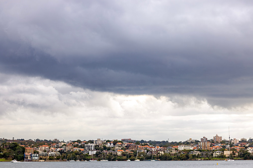 Before storm, city Skyline against overcast sky background with copy space, Sydney, full frame horizontal composition