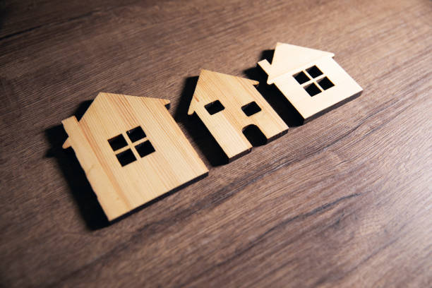 istock wooden house models on table 1485213850