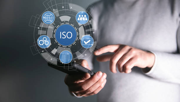 istock ISO and icons on a virtual screen. 1485213960