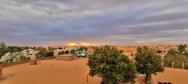 Rub' al Khali Desert Sand Dunes in atmospheric sunset light. Desert Dunes East of Liwa Oasis near the Border of Saudi Arabia and the United Arab Emirates. Emirate of Abu Dhabi, United Arab Emirates, Middle East