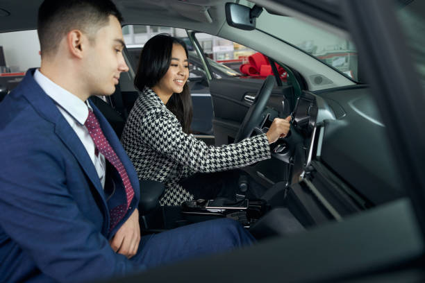 istock Pleasant young male consultant communicates with client in the car 1485219998
