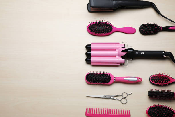 istock Flat lay composition of professional hairdresser tools on beige table, space for text 1485224271