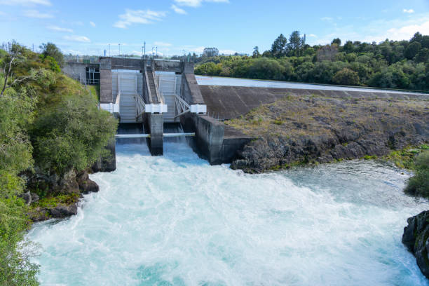 istock Surging wild white-water flowing through open dam gates 1485226688
