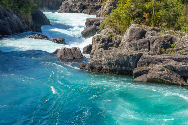 istock Swirling and surging river water through rocky ravine 1485227767