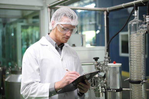istock scientist analyzing a biological and ecological hemp plant used for herbal pharmaceutical CBD oil and THC oil in a laboratory. 1485232432