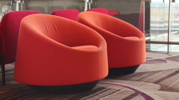 istock vibrant colored upholstery on airport boarding area chairs and sofas 1485232519