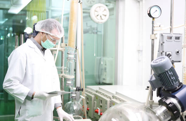 istock scientist analyzing a biological and ecological hemp plant used for herbal pharmaceutical CBD oil and THC oil in a laboratory. 1485232558