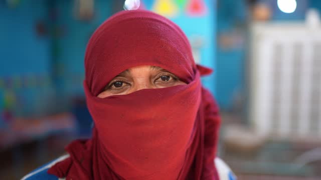 Portrait of a islamic woman with face covered