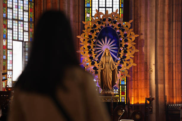 Woman praying in church