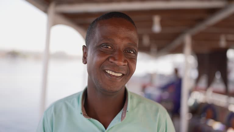 Portrait of a mid adult man at boat