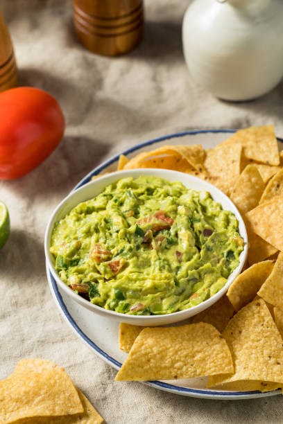 istock Homemade Avocado Guacamole and Tortilla Chips 1485237757