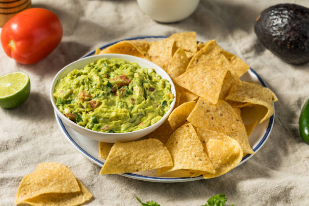 istock Homemade Avocado Guacamole and Tortilla Chips 1485237796