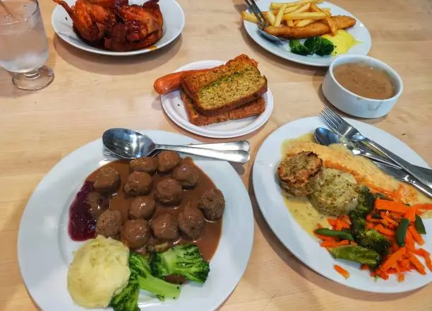 Lunch meatballs,fried chicken , hotdog and salmon