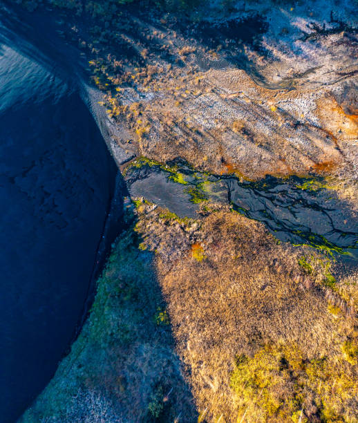 istock Environmental pollution from extraction of copper ore and copper pyrite. View from above. Dead soil and forest 1485242417