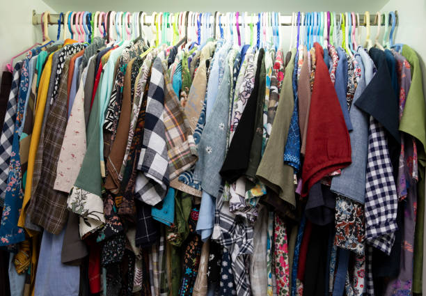 istock Different woman clothes on hangers. 1485243077