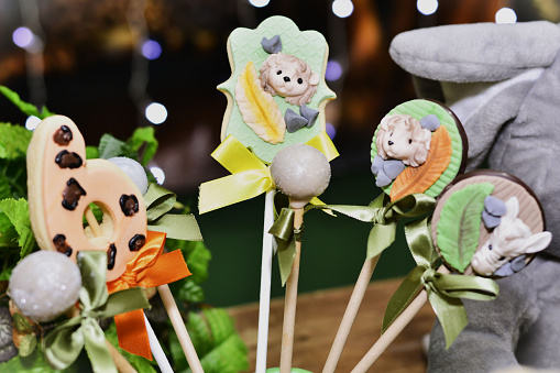 Animal themed lollipops decorating safari themed birthday party table