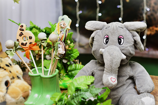 Animal themed lollipops decorating safari themed birthday party table