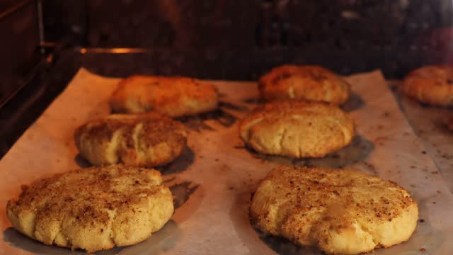 homemade snickerdoodle cookies. Time lapse video of cinnamon cookies are baked in the oven.
