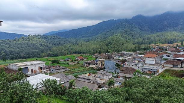 istock village scape  with mountains and blue sky in the background 1485260380