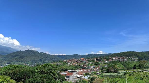 istock village scape view with mountain background and blue sky 1485263808
