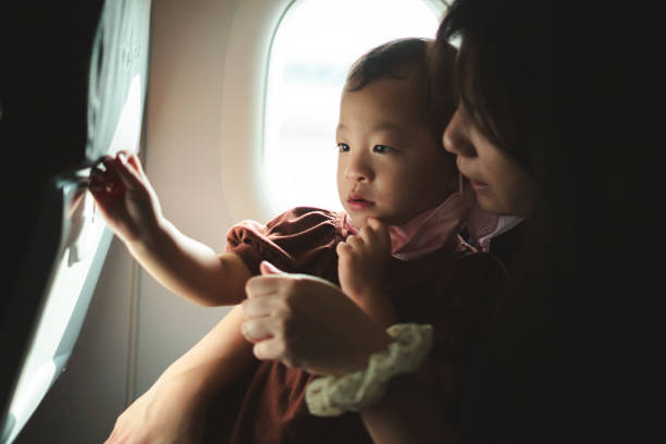 istock Baby girl in flight with mother 1485265247
