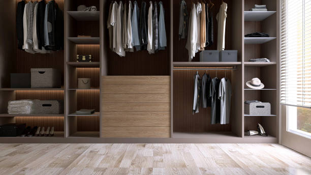 Modern, luxury brown built in, walk in closet wardrobe on parquet floor, wooden shelf, drawer, hidden light with organized shirt, blouse, storage box Modern, luxury brown built in, walk in closet wardrobe on parquet floor, wooden shelf, drawer, hidden light with organized shirt, blouse, storage box for interior design decoration, lifestyle, fashion, product display background 3D walk in closet stock pictures, royalty-free photos & images