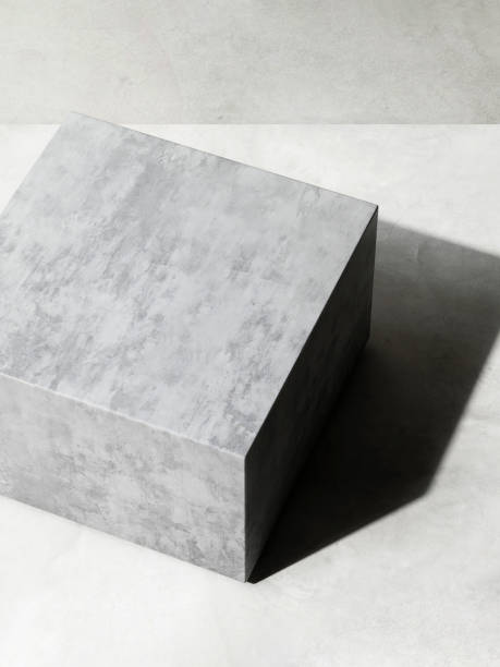 istock Black minimal cube polished concrete podium in sunlight, shadow on gray cement texture floor, wall loft style 1485277630