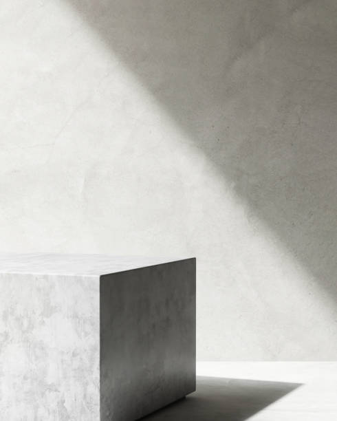 istock Black minimal cube polished concrete podium in sunlight, shadow on gray cement texture floor, wall loft style 1485277631