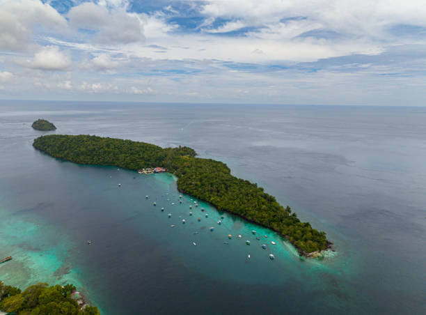 Aerial view of Rubiah Island. Indonesia. Aerial view of Rubiah island with jungle and blue sea. Aceh, Indonesia. sabang beach stock pictures, royalty-free photos & images