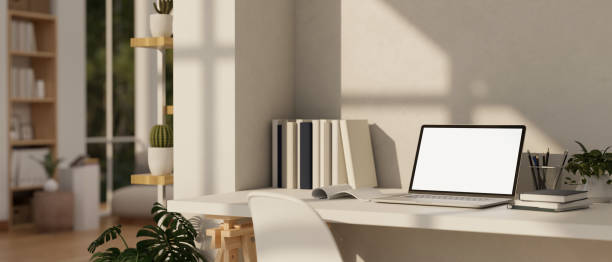istock Minimal Home workspace with laptop mockup on a table in cozy living room 1485285488