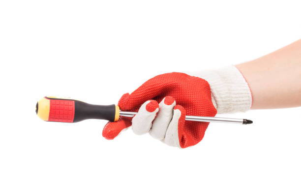 istock A gloved hands a screwdriver. 1485290869