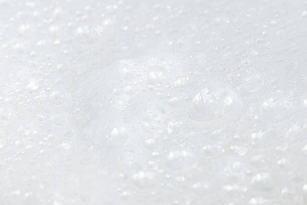 istock Soap bubbles.Abstract background white soapy foam texture.Shampoo foam with bubbles.Indoors shot. 1485290973