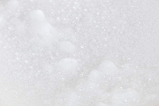 istock Soap bubbles.Abstract background white soapy foam texture.Shampoo foam with bubbles.Indoors shot. 1485290998