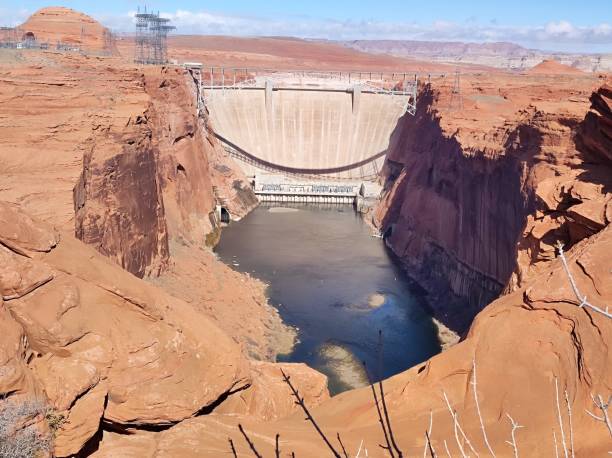 views of the colorado river and glen canyon dam in page, arizona s of the colorado river and glen canyon in page, arizona glen canyon dam stock pictures, royalty-free photos & images