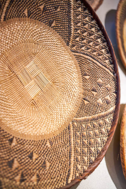 istock Straw hat woven from grass and bamboo wall decoration close-up 1485292157