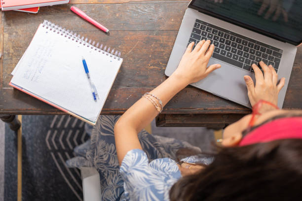 istock Young female student, typing on a laptop. 1485296870