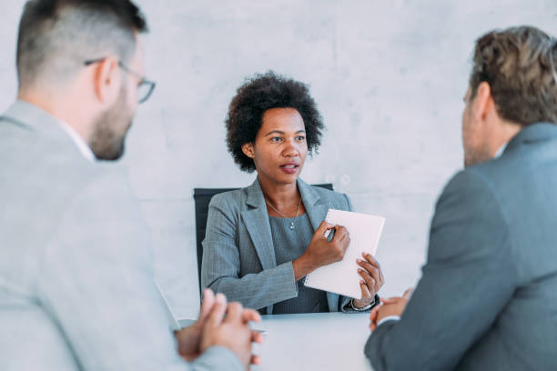 istock Group of business persons talking in the office. 1485297565